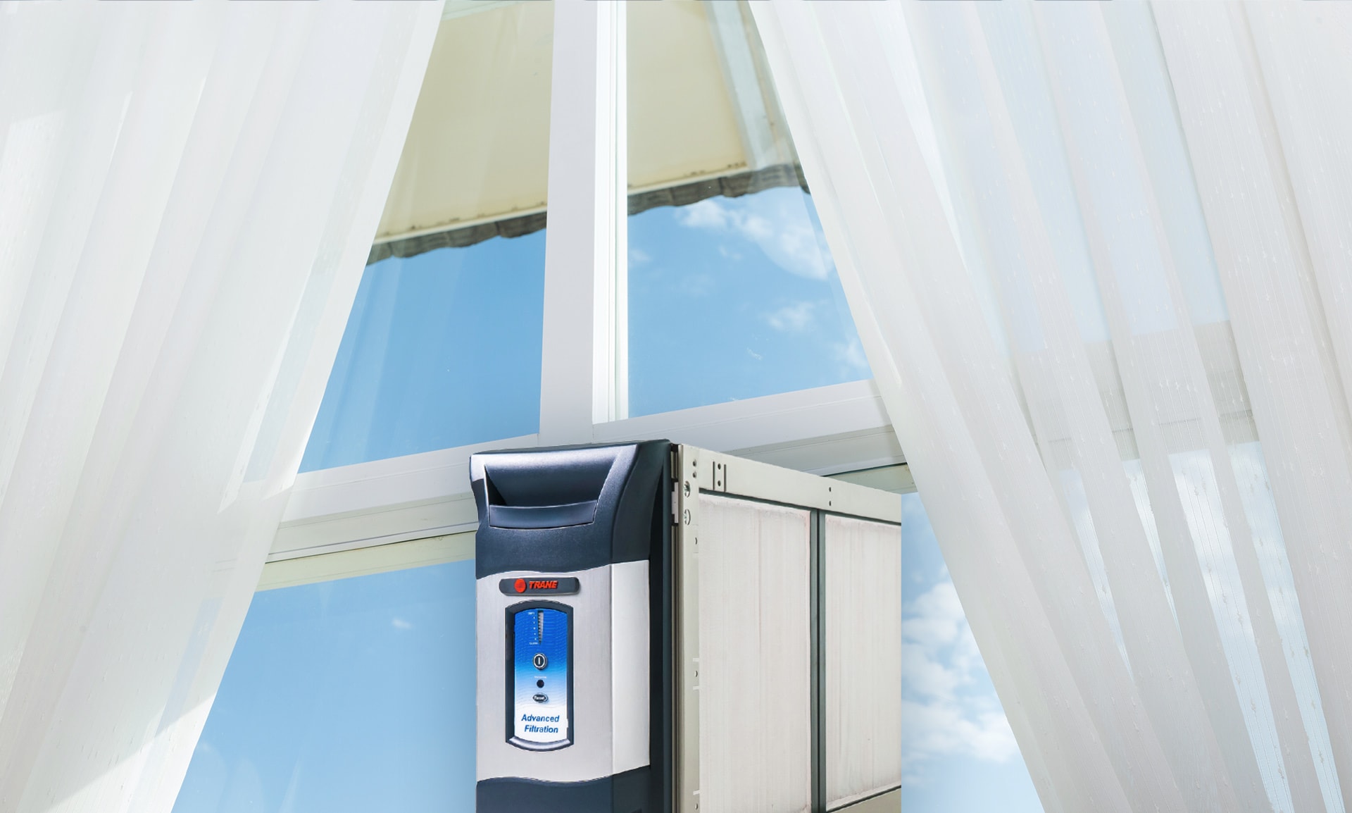 Trane whole-house air filtration system by a window